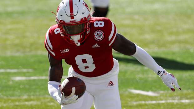 Nebraska Cornhuskers safety Deontai Williams (8) recovers a fumble by Penn State Nittany Lions quarterback Sean Clifford (14) in the first half at Memorial Stadium.